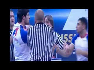 a fight between a dagestan and an armenian in arm wrestling. what are you yelling bitch?